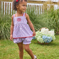 Little English traditional children's clothing. Patriotic red and blue plaid two-piece set for baby girls. Tank top with red ricrac trim and matching ruffled bloomers. 4th of July outfit for baby girls
