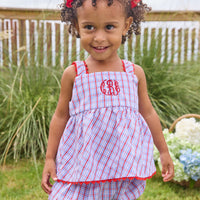 Little English traditional children's clothing. Patriotic red and blue plaid two-piece set for baby girls. Tank top with red ricrac trim and matching ruffled bloomers. 4th of July outfit for baby girls