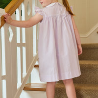 Little English traditional children's clothing. Classic dress for toddler girls in lavender stripe seersucker with peter pan collar and ballet slipper embroidery