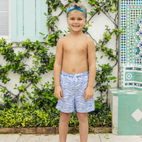 Little English traditional children's clothing. Blue swim trunks with alligator print for little boys for summer