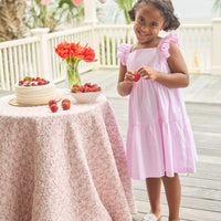 Little English traditional children's clothing. Classic sleeveless tiered dress for girls in light pink seersucker gingham