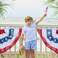 Little English traditional children's clothing. Blue gingham shorts with all-over American flag embroidery for boys. Boy's shorts for 4th of July.