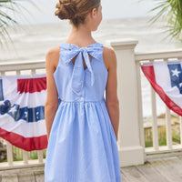 Little English traditional children's clothing. Royal blue mini gingham sleeveless dress with white ricrac trim and bow tie in back for little girls