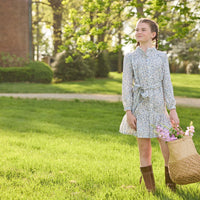 Little English traditional children's clothing. Long sleeve blue, brown, and cream floral shirt dress with tie sash for older girls.