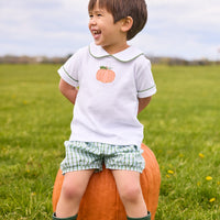 Little English classic short set for little boys. White knit peter pan shirt with applique pumpkin at the center and coordinating banded shorts in green Leland Plaid.