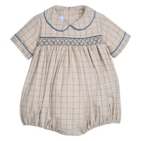 Little English classic children's clothing. Smocked peter pan bubble in tan and blue Durham windowpane with blue piping for baby boys