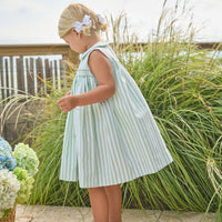 Little English traditional children's clothing. Classic sleeveless smocked peter pan dress with soft green and white stripes for little girls