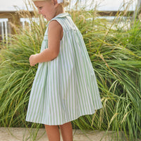 Little English traditional children's clothing. Classic sleeveless smocked peter pan dress with soft green and white stripes for little girls
