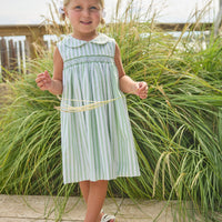 Little English traditional children's clothing. Classic sleeveless smocked peter pan dress with soft green and white stripes for little girls