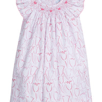 Little English traditional children's clothing. Girl's white and pink floral print smocked dress. Easter dress for toddler girls