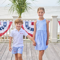 Little English traditional children's clothing. Royal blue mini gingham sleeveless dress with white ricrac trim and bow tie in back for little girls