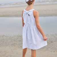 Little English traditional children's clothing. Light blue and white Savannah Stripe sleeveless dress with white bow tie in back for little girls
