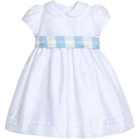 Little English X Luciana Emilia capsule collection bow sash in 100% silk blue check paired with white Peter Pan Formal Dress. Special occasion outfit for girls
