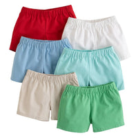 Little English traditional children's clothing, toddler boys elastic waist pull on white shorts, above the knee cut