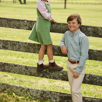 Little English traditional children's clothing. Green Watercress Gingham button down with tan Pebble Twill Classic Pants for boys. Watercress Green and pink floral long sleeve jumper set for girls.
