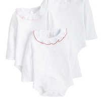 Caroline Knit Onesies in light pink, white, and red