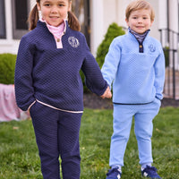 little english classic quilted pullovers in navy and light pink and in light blue and navy, quilted joggers in navy and light blue