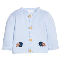 Little English traditional children's clothing. Light blue cotton cardigan with crocheted football and helmet on either side and in back for baby boys.