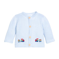 Little English traditional children's clothing. Light blue cotton cardigan with crocheted holiday trains on either side and in back for baby boys.