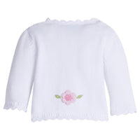 Little English traditional children's clothing. Baby girl's white crochet sweater with pink flowers for Spring. Gift clothing for baby girl