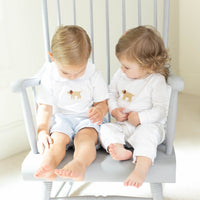 Little English traditional children's clothing. Toddler boy's white knit peter pan shirt with dog crochet for Spring. Gift clothing for toddler boy