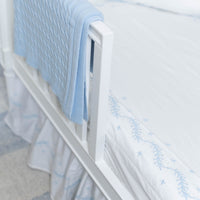 Little English classic nursery goods for baby, white crib sheet with simple light blue embroidery along the edges for baby