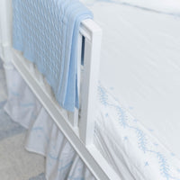 Little English classic nursery goods for baby, white crib sheet with simple light blue embroidery along the edges for baby