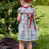 Little English classic children's clothing. Toddler girls puff sleeve dress in red and green plaid with ruffled peter pan collar and bow tie sash in back.