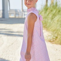 Little English classic knee length dress with pink floral pattern and bow in back, traditional girl's dress for spring