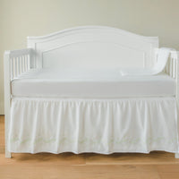 Little English classic nursery goods for baby, white crib skirt with simple light green embroidery along the edges for baby