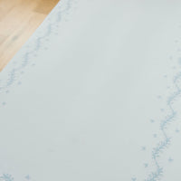 Little English classic nursery goods for baby, white crib sheet with simple light blue embroidery along the edges for baby