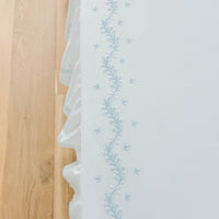 Little English classic nursery goods for baby, white crib sheet with simple light blue embroidery along the edges for baby