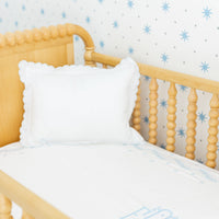 Little English classic nursery goods for baby, white crib sheet with simple light blue embroidery along the edges for baby