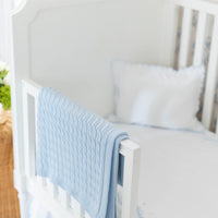 Little English classic nursery goods for baby, white crib sheet with simple light blue embroidery along the edges for baby