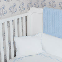 Little English classic nursery goods for baby, white crib sheet with simple light blue embroidery along the edges for baby