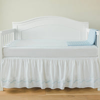 Little English classic nursery goods for baby, white crib skirt with simple light blue embroidery along the edges for baby