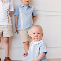 Little English x Mi Golondrina blue cotton romper for spring, baby boy's short sleeve peter pan polo romper with white embroidery