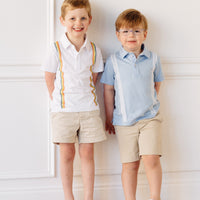 Little English x Mi Golondrina white cotton polo for spring, boy's short sleeve polo with multicolored embroidery