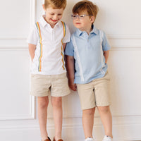 Little English x Mi Golondrina white cotton polo for spring, boy's short sleeve polo with multicolored embroidery