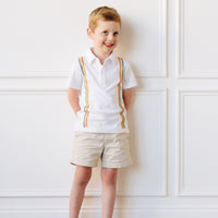 Little English x Mi Golondrina white cotton polo for spring, boy's short sleeve polo with multicolored embroidery