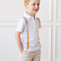 Little English x Mi Golondrina white cotton polo for spring, boy's short sleeve polo with multicolored embroidery