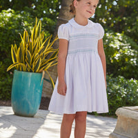 Little English traditional girl's clothing, classic smocked dress for toddler girls with peter pan collar and sash, little girl's flower girl dress with light blue smocking