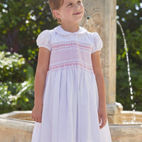 Little English traditional girl's clothing, classic smocked dress for toddler girls with peter pan collar and sash, little girl's flower girl dress with light pink smocking