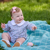 Little English traditional children's clothing. Long sleeve pink, aqua, and green Fondren Floral cotton knit bubble with white peter pan collar and pink piping detail for baby girls.