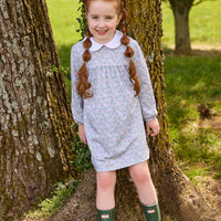 Little English traditional children's clothing. Long sleeve pink, aqua, and green Fondren Floral cotton knit dress with white peter pan collar and pink piping detail for little girls.