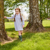 Little English traditional children's clothing. Long sleeve pink, aqua, and green Fondren Floral cotton knit dress with white peter pan collar and pink piping detail for little girls.