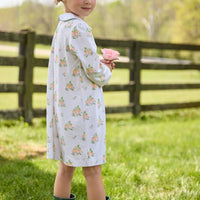 Little English traditional children's clothing. Long sleeve pumpkin floral print cotton knit dress with white peter pan collar and green piping detail for little girls.