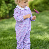 Little English traditional children's clothing. Long sleeve pink, blue, and lavender Ashbrook Floral cotton knit romper with white peter pan collar and pink piping detail for baby girls.