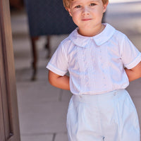 Little English traditional children's clothing. Toddler boy's dressy blue and white short set with white shirt and blue shorts for Spring. Special occasion outfit for little boys