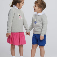 Little English traditional children's clothing. Gray intarsia sweater with frenchie dog motif for little girl, Gray intarsia sweater with frenchie dog motif for little boy, Jillian skirt in hot pink corduroy, banded short in royal blue corduroy, long sleeve hastings polo in white, piped peter pan shirt in white, for fall